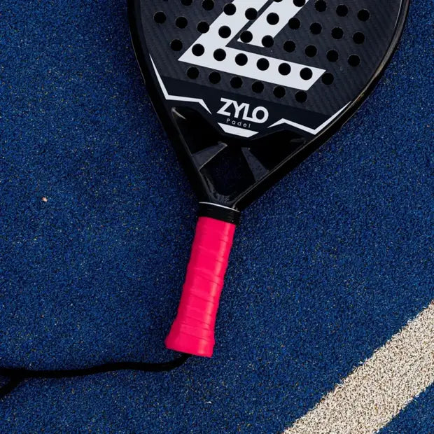Red Extra Tack Overgrip applied to a ZYLO racket handle